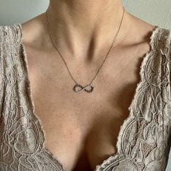 Stříbrný přívěšek rhodiovaný infinity se zirkony včetně řetízku